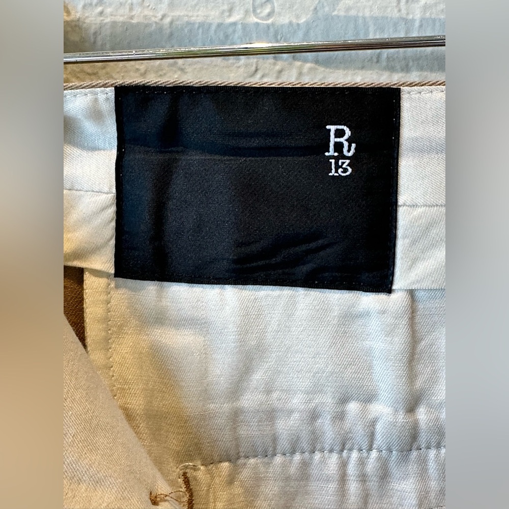 R13 Cropped Triple-pleat Crossover Trousers In Beige - Picture 15 of 16